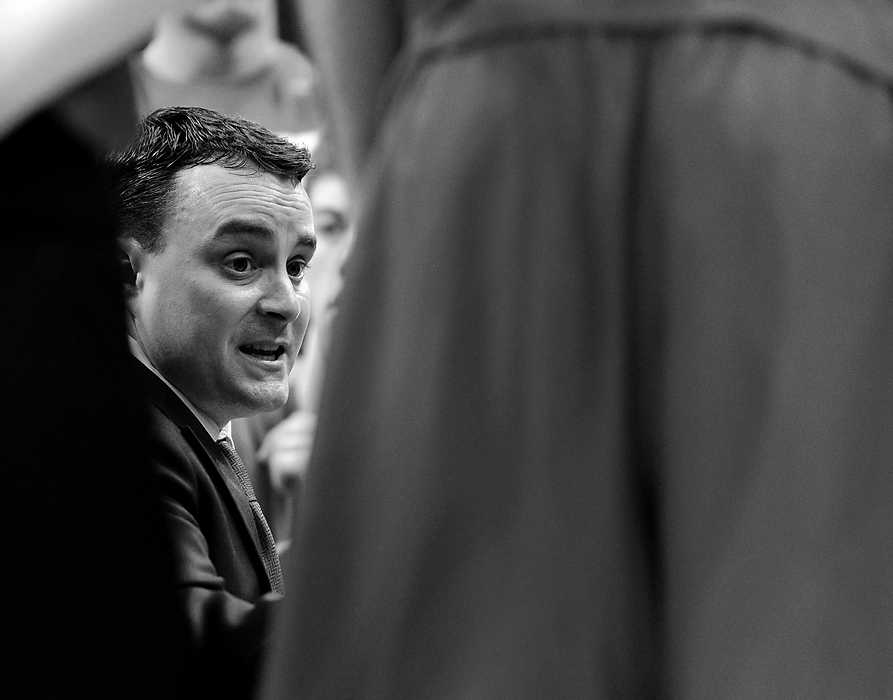 Second Place, Ron Kuntz Sports Photographer of the Year - Erik Schelkun / Elsestar ImagesDayton Flyers Head Coach Archie Miller discusses a game plan during a time out against Florida in the Elite 8 round of the NCAA tournament in Memphis.