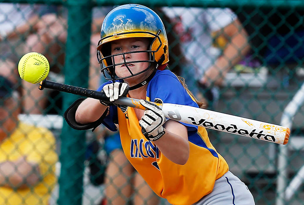 Third Place, Ron Kuntz Sports Photographer of the Year - Logan Riely / Ohio UniversityGahanna short stop Alyson Shaw bunts the ball during their district softball finals against Westerville Central at Pickerington Central high school.
