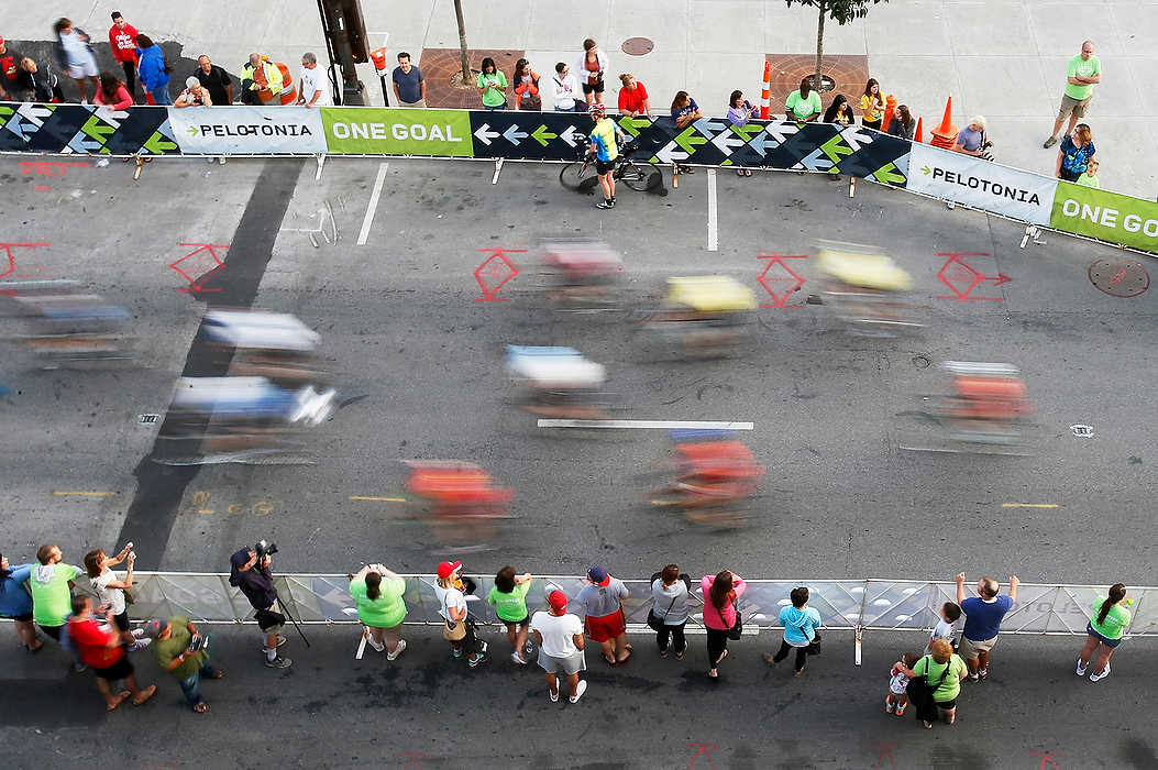 Third Place, Ron Kuntz Sports Photographer of the Year - Logan Riely / Ohio UniversityBoth 100 and 180 milers began their journey on Rich street to kick off the 6th annual Pelotonia held in downtown Columbus. Over 7,000 cyclists ride varying distances to cure cancer.