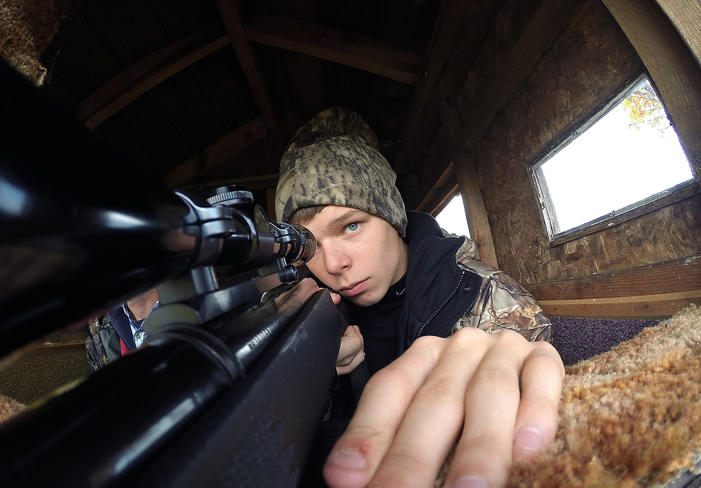 First Place, Student Photographer of the Year - Logan Riely  / Ohio UniversityMichael Schult looks through his rifle scope in search of deea while hunting with a friend on his private property located in Jeffersonville, NY. Michaels father taught him everything he knows about hunting nut unfortunately passed away two years prior.