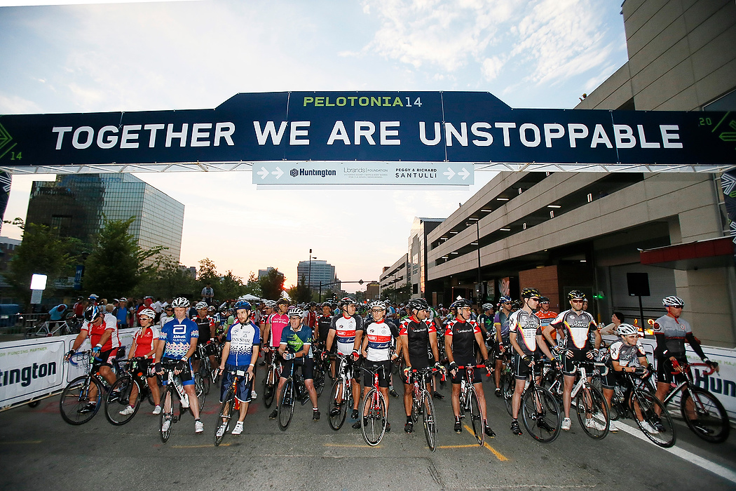 First Place, Student Photographer of the Year - Logan Riely / Ohio UniversityClass A riders sit at the start line moments before heading out for the 6th annual Pelotonia held in downtown Columbus. Over 7,000 cyclists ride varying distances to cure cancer. 