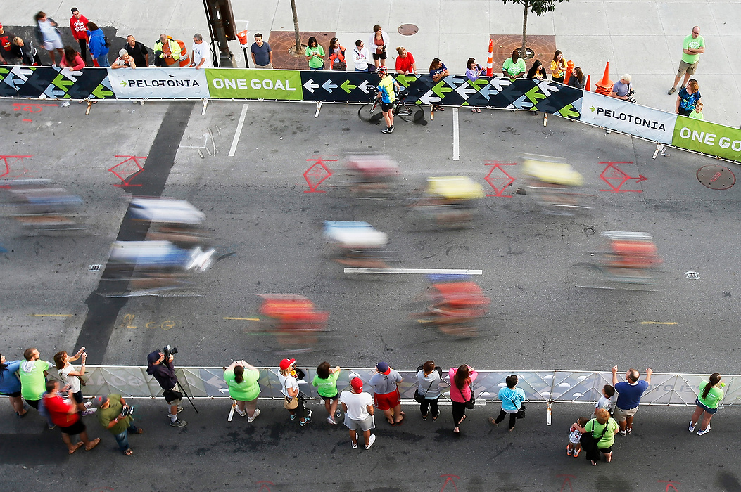 First Place, Student Photographer of the Year - Logan Riely / Ohio UniversityBoth 100 and 180 milers began their journey on Rich street to kick off the 6th annual Pelotonia held in downtown Columbus. Over 7,000 cyclists ride varying distances to cure cancer.