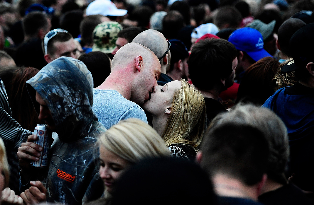 First Place, Student Photographer of the Year - Logan Riely / Ohio UniversityA couple enjoy a quiet moment with each other amongst the crowd during the annual Rock on the Range music festival at the Columbus Crew Stadium. Over 103,000 people will have attended the event over the next three days.