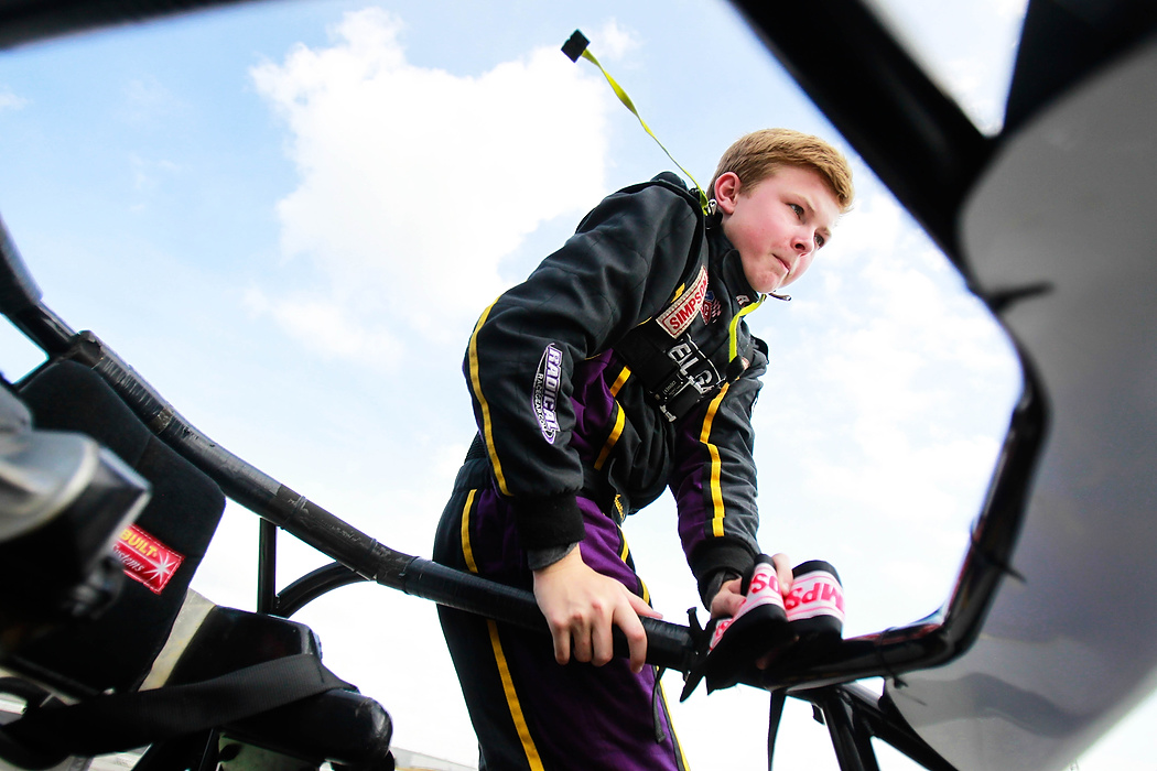 Second Place, Student Photographer of the year - Isaac Hale / Ohio UniversityAustin Nemire, a sophomore at Sylvania Northview, climbs into his USAC HPD Midget sprint car at the Toledo Speedway.