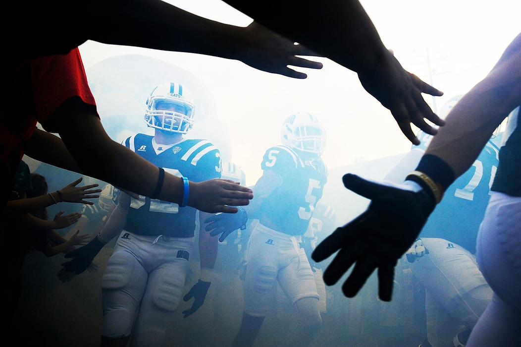 First Place, Student Photographer of the Year - Logan Riely / Ohio UniversityThe Ohio Bobcats take the field against Idaho for  their home opener at Peden Stadium.