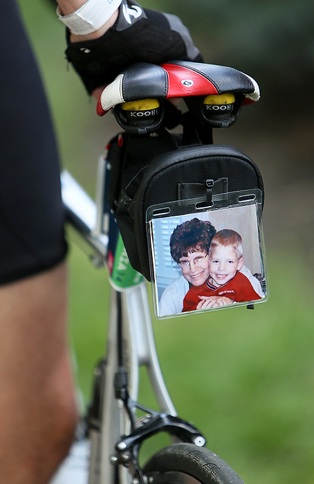 Third Place, Student Photographer of the year - Jenna Watson / Kent State University Cal Krebs, 18, of New Albany, biked the Pelotonia 100-mile ride with a picture of him and his grandmother Daurie Owens, who died from colon cancer in 2013, attached to his seat. 