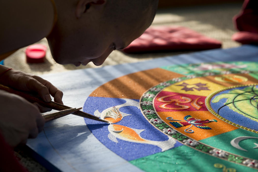 Second place, Larry Fullerton Photojournalism Scholarship - Alex Driehaus / Ohio UniversityTenzin Dawa, a monk from the Labrang Monastery in India, works on a sand mandala on the fifth floor of Baker University Center in Athens.