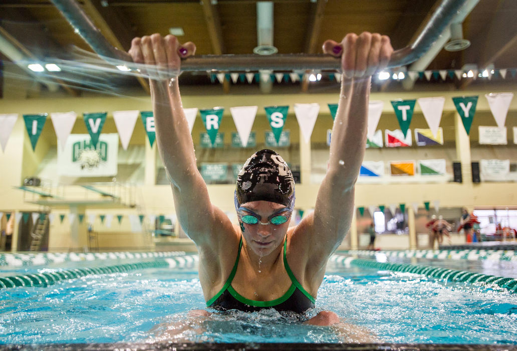 First place, Larry Fullerton Photojournalism Scholarship - Sarah Stier / Ohio UniversityOhio University junior Addy Ferguson prepares to start her 100-yard backstroke race during a meet against Miami University. Ferguson won the event with a season-best time of 55.16 seconds.