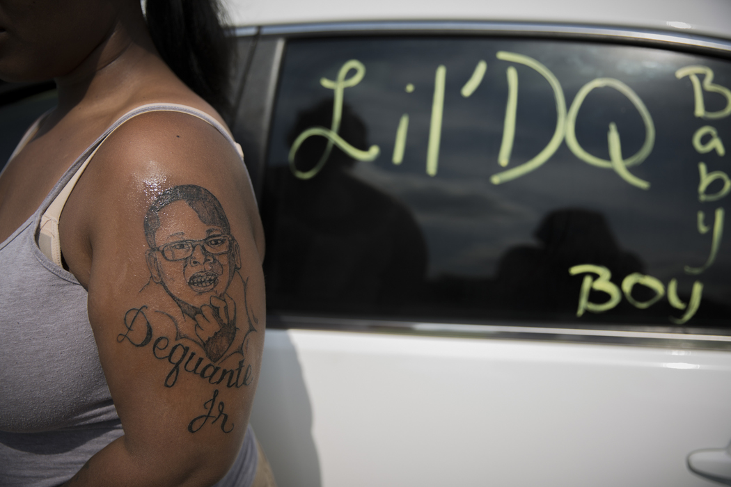 Best of Show - Liz Moughon / Ohio UniversityMicheshia tattooed her arm with her son's face and reminds the Louisville community of her loss by diligently painting her car windows in memory of him.
