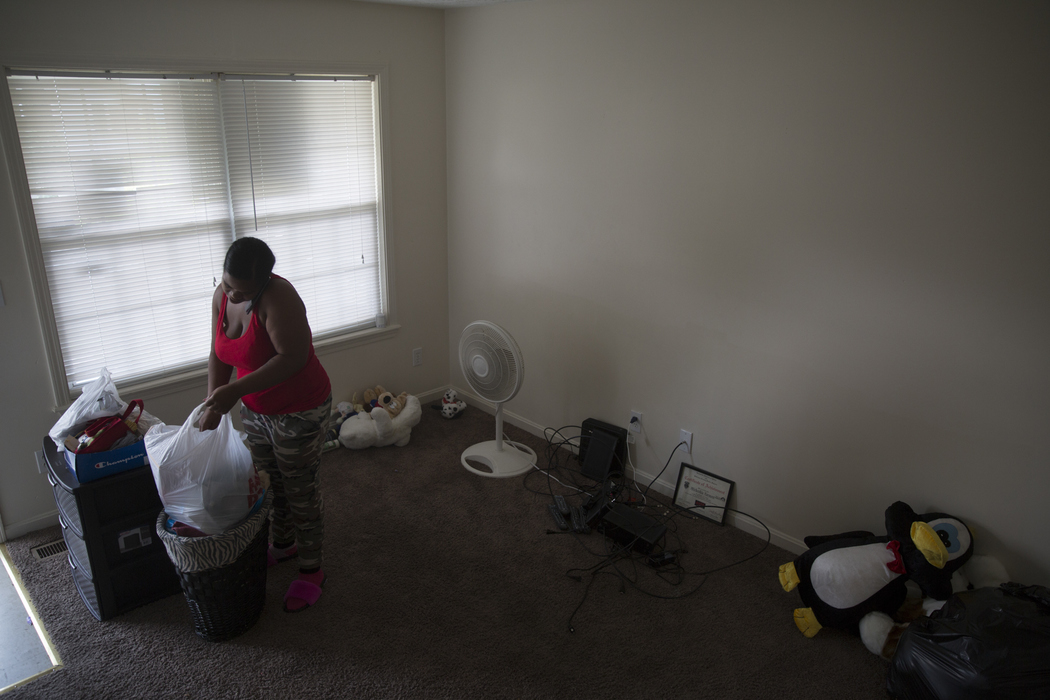 Best of Show - Liz Moughon / Ohio University"When I go in that house it's evil," Micheshia says as she packs up her old house where Dequante was shot. "I feel it should be nobody else moving in that house. It's a danger hazard, especially if a person has children."