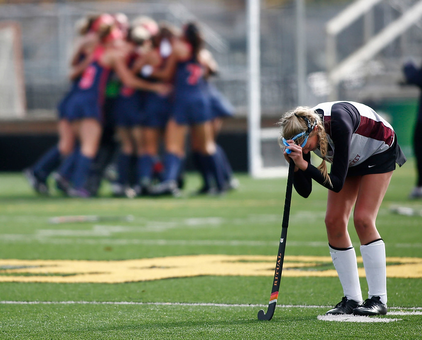 Award of Excellence, Sports Feature - Fred Squillante / The Columbus DispatchThomas Worthington players celebrate after they defeated Columbus Academy in the state field hockey championship game at Upper Arlington High School.  At right is Academy's Lexi Leader.