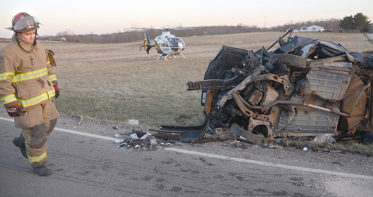 Award of Excellence, Spot News - Patricia Schaeffer / The (Lisbon) Morning JournalSam Entrikin, 40, of Salem was airlifted by STAT MedEvac to St. Elizabeth's Health Center in Youngstown following a head-on crash on Salem Grange Road at the Conkle Road intersection. 