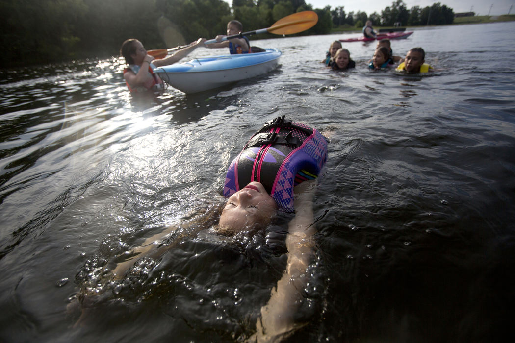 Third Place, Student Photographer of the Year - Marlena Sloss / Ohio UniversityRilyn Truesdale of Duff, 8, floats in the pond of her aunt and uncle Abby and John Truesdale in Duff, Ind. on June 21, 2018.