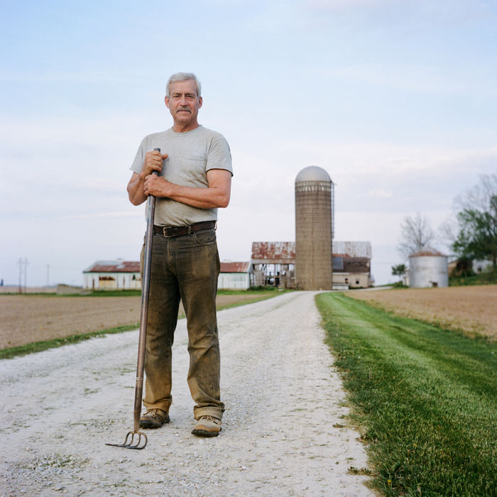 Third Place, Student Photographer of the Year - Marlena Sloss / Ohio UniversityMike Steckler, 63, stands for a portrait on his land in Huntingburg, Ind. on May 16, 2018. Steckler spent most of his life in the agriculture business with his family of 9 children and now 12 grandchildren. “If you farm for a while, you become very humble. Because, whether you want to accept the lesson or not, we are not in control of much of anything. In two years, we can invest the same amount of energy, and one year, He allows you to have a bounty, and the next year you end up with nothing. It’s not up to us. What He gives us is a gift.” 