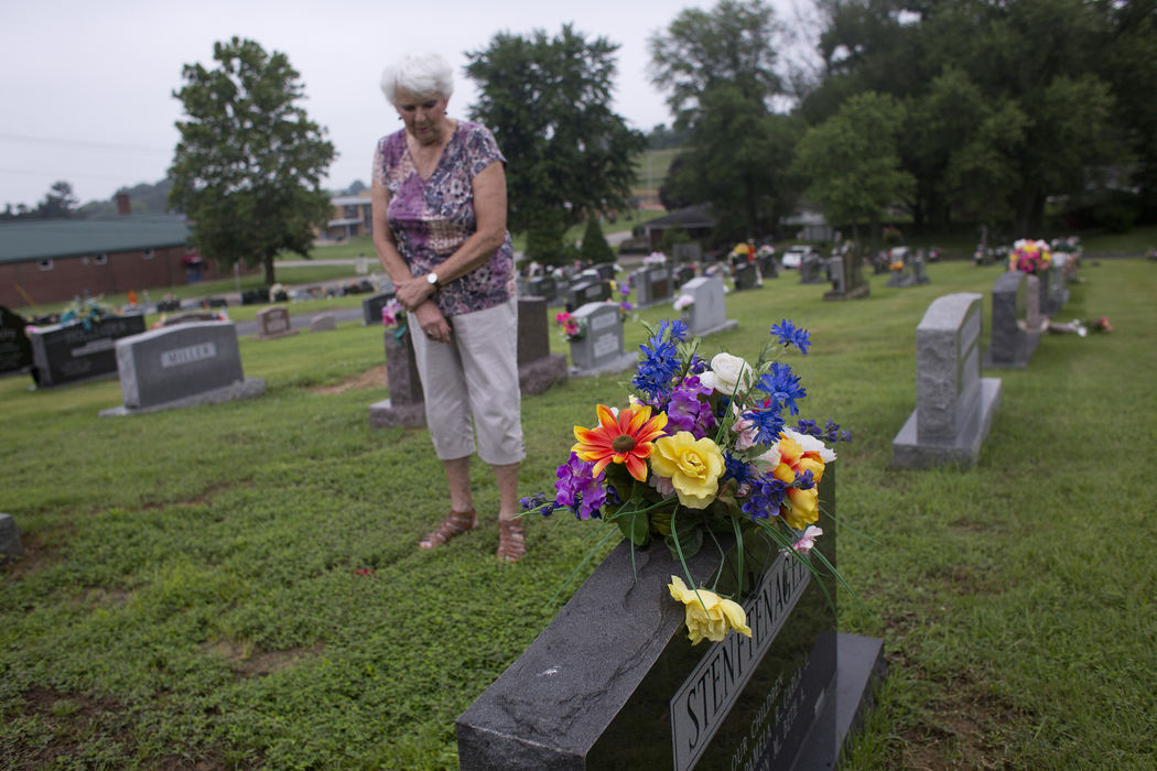 Third Place, Student Photographer of the Year - Marlena Sloss / Ohio UniversityMarge Stenftenagel says a prayer at Si's grave in Jasper, Ind. on June 13, 2018. When Marge visits her late husband, Si, at Fairview Cemetery, she often thinks about what they used to do together. “I tell him he’s in a better place,” she said. 