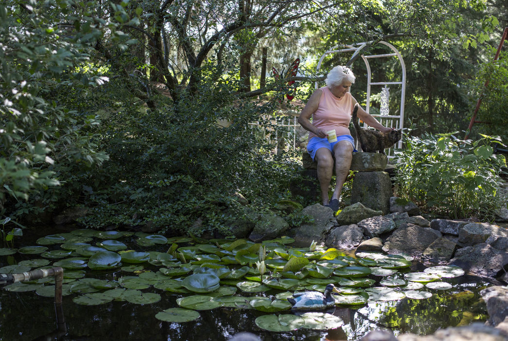 Third Place, Student Photographer of the Year - Marlena Sloss / Ohio UniversityMarge Stenftenagel now spends time there with her new companions: goldfish, cat and dog, as she does on June 21, 2018. While she is still active in the community, she loves to sit by the pond, where she and Si spent the most time together. 