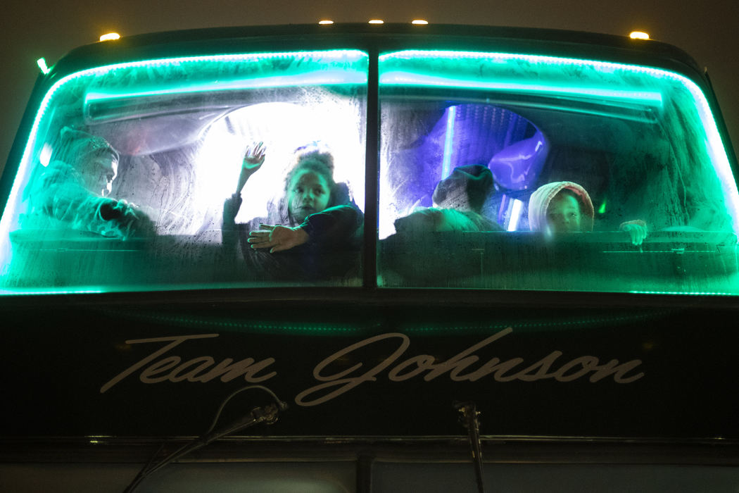 Award of Excellence, Feature - Rebecca Benson / The Blade, "Looking Out"Kids look out the window of a double decker limo before leaving to look at Christmas lights in Toledo on December 5, 2018. Homeless and less fortunate families staying in the Family house were given Christmas presents for each child in their family and given limo rides around Toledo sponsored by Team Johnson Limo and Mavillino Custom Homes. 