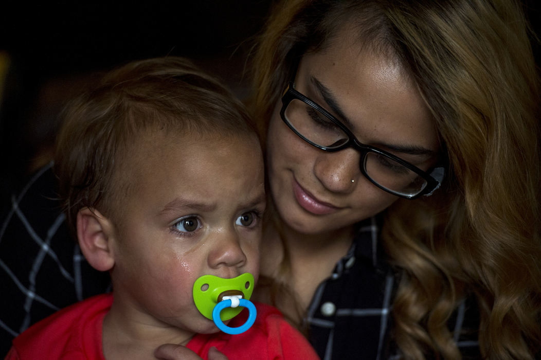 Second Place, Feature Picture Story - Marlena Sloss / Ohio University, "Teen Mother"Vincent cries before Brooke leaves for work after dropping him at a relative's home in Evansville, Ind. on Sept. 12, 2017. "Its been a rollercoaster," said Brooke. "Sometimes you will have bad days, but with Vincent it's just pushed me to do a lot better for myself and for him.