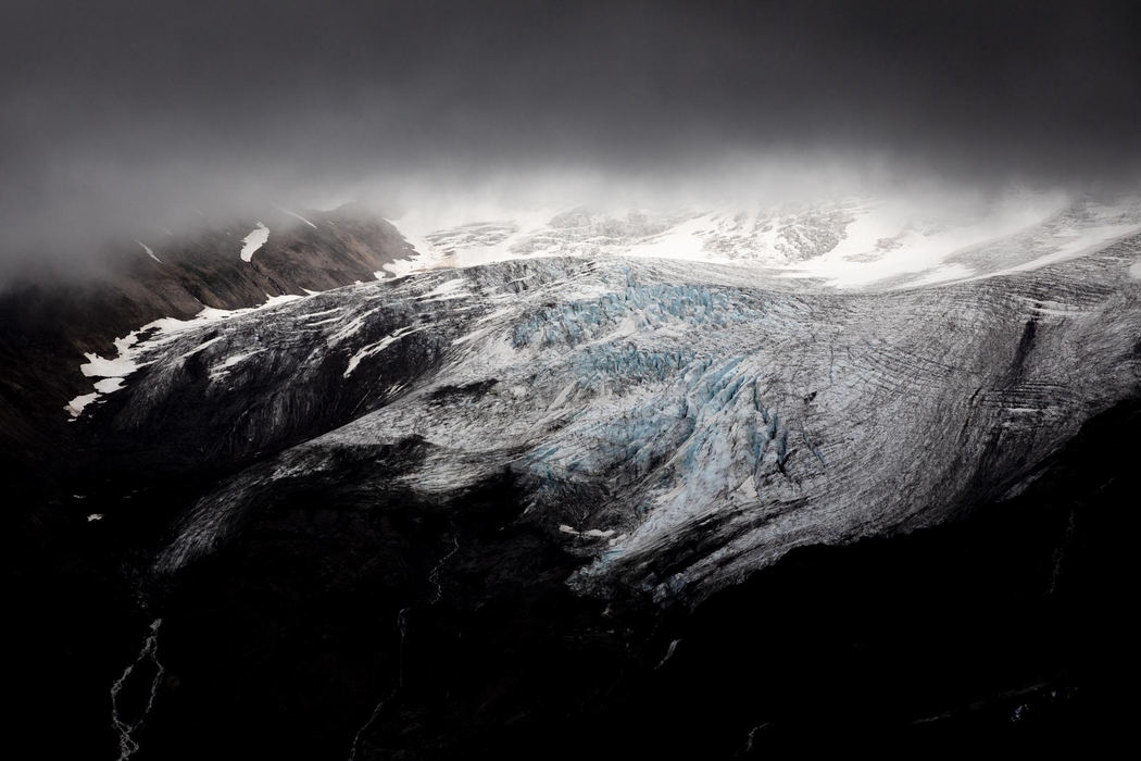 First Place, Larry Fullerton Photojournalism Scholarship - Nathaniel Bailey / Kent State UniversityThe base of the Coleman Glacier on Mt. Baker, WA, is seen as a rain storm approaches, August 3, 2018. According to Mauri Pelto, author of "North Cascade Glacier Retreat", the glacier retreated 1,443 feet between 1980 and 2006.