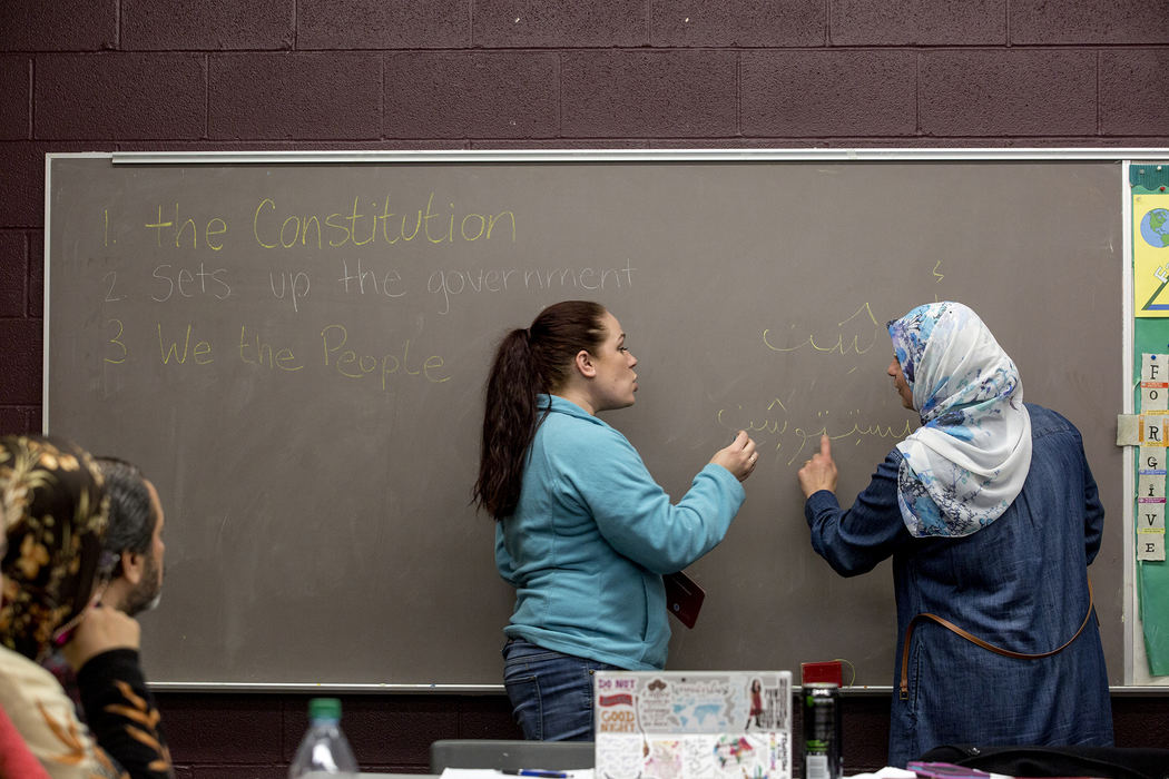 Second Place, Ohio Understanding Award - Jessica Phelps / Newark Advocate, "First Generation"Dunya Al Haek (right) helps Gretchen Klingler translate words from Arabic to English during a class on US citizenship. Dunya is taking the class to make sure she passes the citizenship test in the next few months so she can officially become a US citizen. 