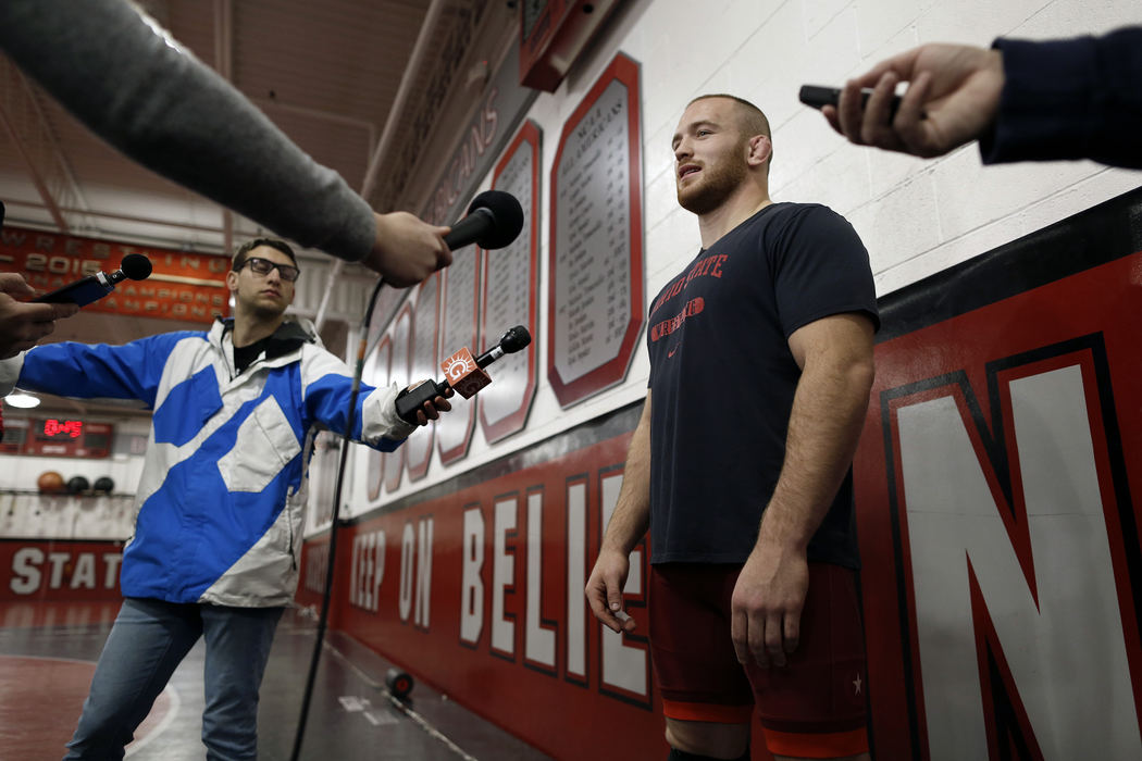 Second Place, Photographer of the Year - Large Market - Kyle Robertson / The Columbus DispatchOhio State's Kyle Snyder answer questions for the media before practice at Ohio State Steelwood center on January 16, 2018.    