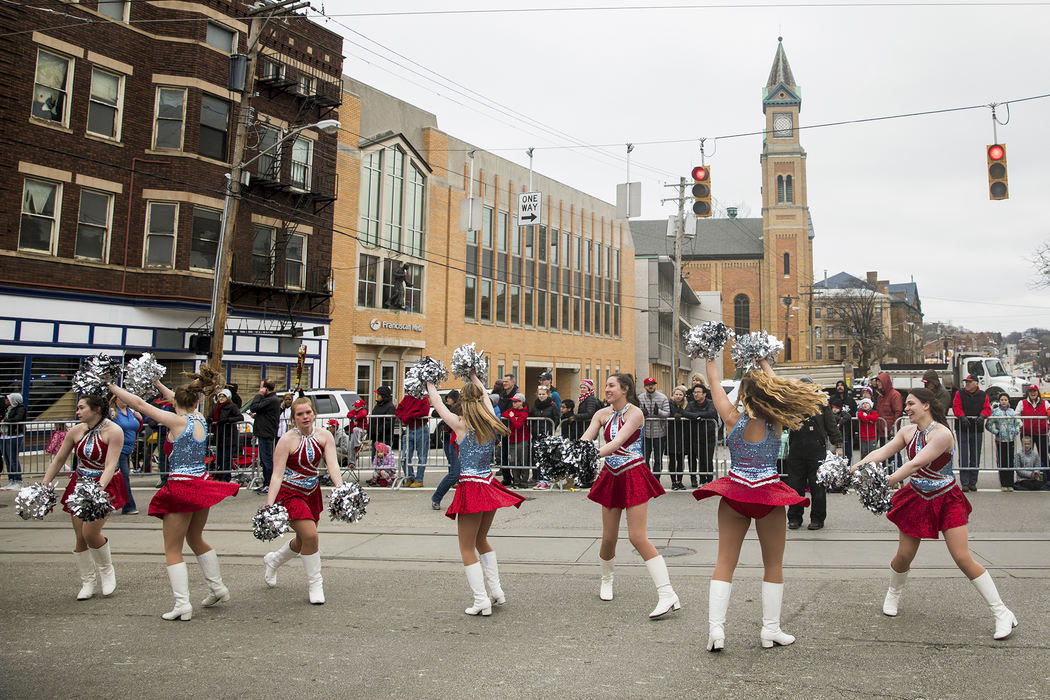 First Place, Photographer of the Year - Large Market - Meg Vogel / The Cincinnati Enquirer187 units participate in the 99th annual Findlay Market Opening Day Parade before the Cincinnati Reds play the Chicago Cubs, April 1, 2018.