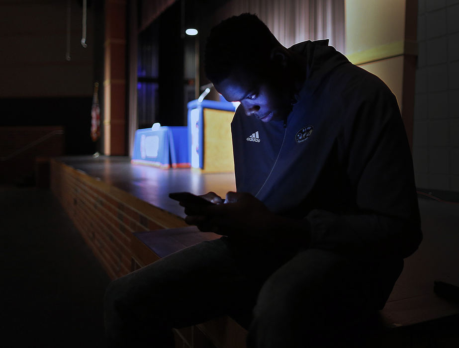 Second Place, Photographer of the Year - Large Market - Kyle Robertson / The Columbus DispatchOlentangy Orange's Zach Harrison drafts up his tweet of which school he will pick before his announcement that he will sign with Ohio State over Michigan and Penn State in front of family, friends and students at Olentangy Orange High School on December 19, 2018. 