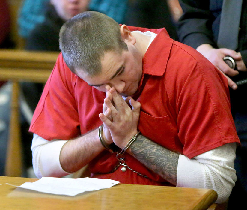 Award of Excellence, Photographer of the Year - Small Market - Scott Heckel / The Canton RepositoryJustin T. Layne wipes away a tear during his guilty plea in the death of six month old Braydon M. Perry in a Stark County Common Peas courtroom in Canton on Tuesday, Dec. 18, 2018. 