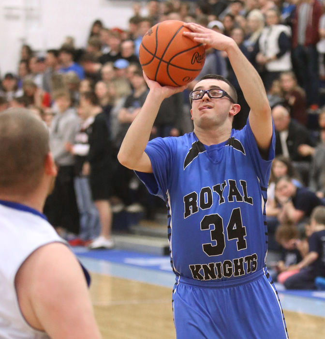 Award of Excellence, Photographer of the Year - Small Market - Scott Heckel / The Canton RepositoryRoyal Knights' Max Broom takes a shot during their Stark Public Special Olympics game against Medina DD at Louisville on Thursday, Jan. 11, 2018.