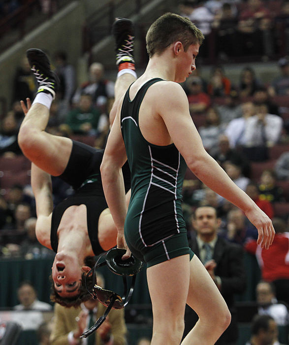 Second Place, Photographer of the Year - Small Market - Lorrie Cecil / ThisWeek NewspapersDelta's Cole Mattin does a backflip after defeating Northridge's Klay Reeves in the 126 lbs weight class of the division III State Wrestling Championship finals at the Schottenstein Center on Saturday March 10, 2018.  