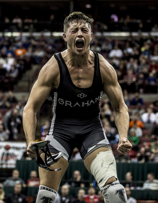 First Place, Photographer of the Year - Small Market - Jessica Phelps / Newark AdvocateJoey Sanchez of St. Paris Graham Local reacts after beating Jason Hubbard of Stubenville in the division II 152 pound weight class at the OHSAA 2018 state wrestling championships, March 11. 