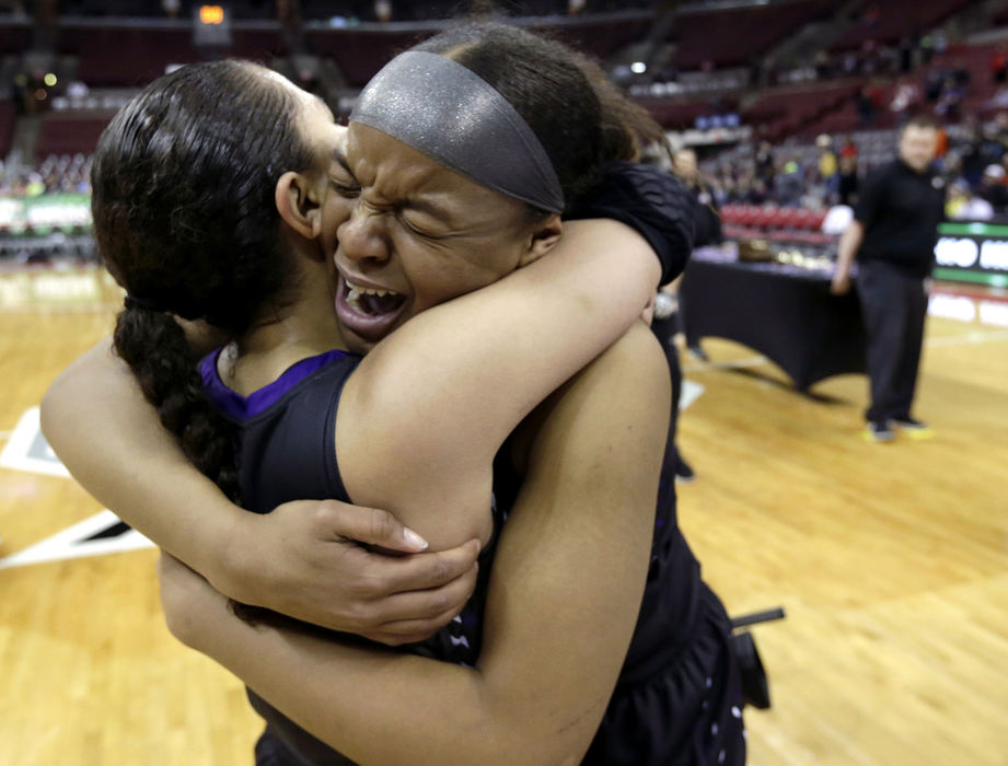 , Photographer of the Year - Small Market - Shane Flanigan / ThisWeek NewspapersPickerington Central's Jada Tate lets her emotions out while hugging teammate Madison Greene after the Tigers defeated Solon, 49-45, in the Division I state championship game March 17, 2018, at The Jerome Schottenstein Center in Columbus, Ohio. Central claimed its seventh girls basketball state title with a 49-45 win over Solon.