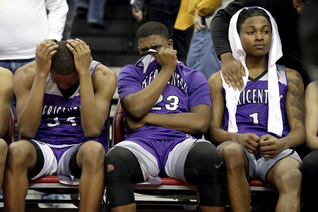, Photographer of the Year - Small Market - Shane Flanigan / ThisWeek NewspapersFrom left, Africentric's Ly'Heem Hilliard, John Figueroa and Dorian Holloway react on the bench after a 67-57 loss to Deer Park in the Division III state championship game March 24, 2018, at The Jerome Schottenstein Center in Columbus, Ohio.