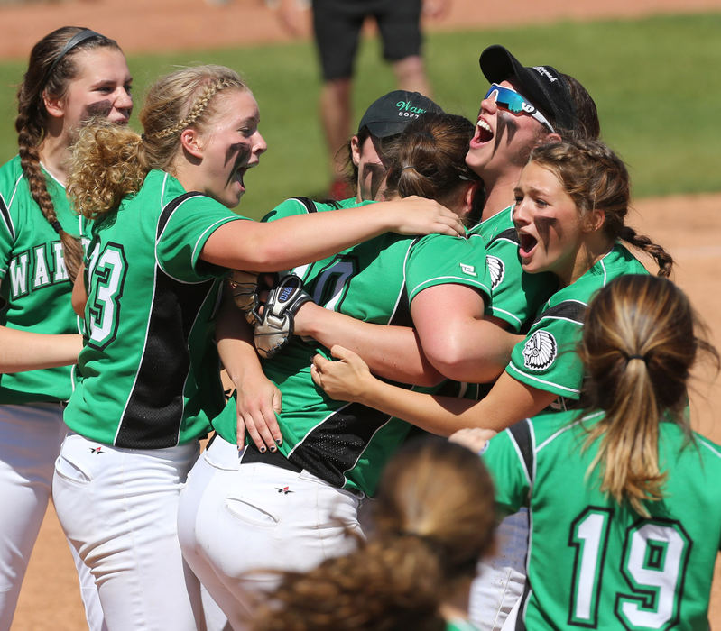 Award of Excellence, Photographer of the Year - Small Market - Scott Heckel / The Canton RepositoryWest Branch players mob pitcher Kelsey Byers (center) after their 3-1 victory over Perry in the D2 regional semifinal game at Firestone Stadium in Akron on Wednesday, May 23, 2018.