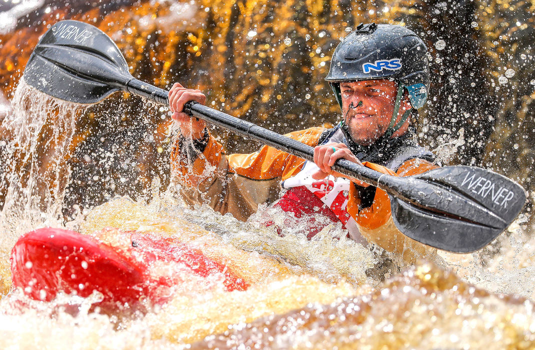 Award of Excellence, Sports Action - Tyler Schank / Metropolitan Community College , "Whitewater"Isaac Braun reacts after a tough drop on the Saint Louis River during the Blast to the Bridge event at Paddlemania on July 28, 2018. About 30 kayakers entered the race to see who could make it to the Swinging Bridge in Jay Cooke State Park in Duluth the fastest.