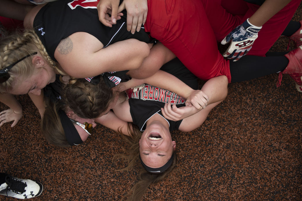 Award of Excellence, Sports Feature - Carolyn Rogers / Ohio University, "SPF"Southmoreland softball team members dog pile pitcher Jess Matheny, after the WPIAL softball championship triple-header at Seton Hill University in Greensburg, Pennsylvania, on May 31, 2018. Southmoreland won 12-1.