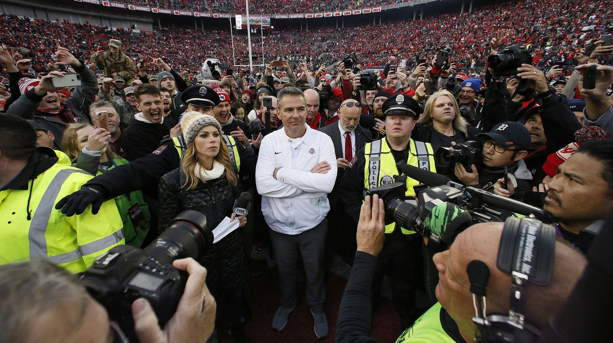 First Place, Team Picture Story - Adam Cairns / The Columbus Dispatch, "Ohio State vs. Michigan"Ohio State Buckeyes head coach Urban Meyer awaits his postgame interview following the team's game against Michigan at Ohio Stadium in Columbus on Nov. 24, 2018. Ohio State won 62-39. 