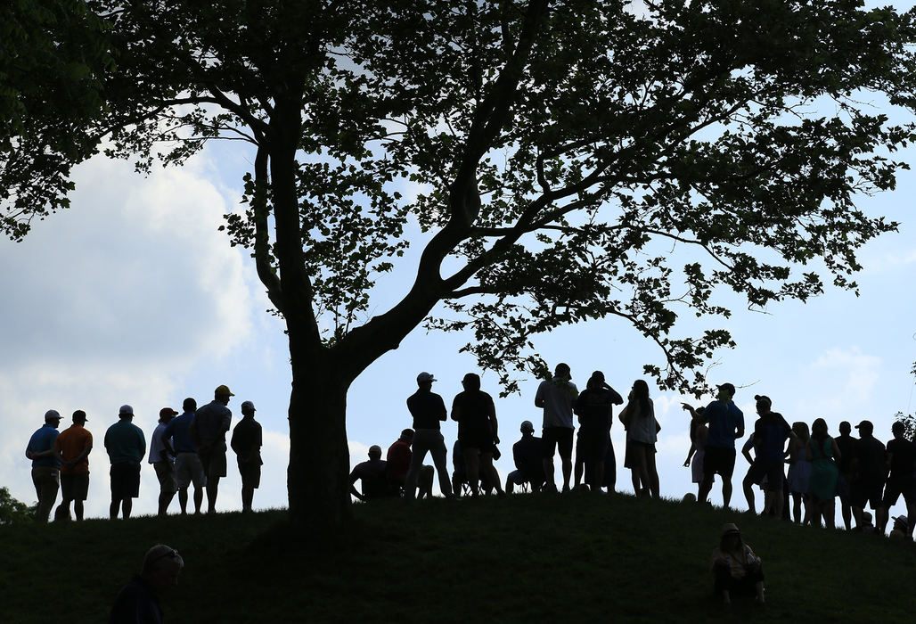 Second Place, Team Picture Story - Adam Cairns / The Columbus Dispatch, "The Memorial"Patrons watch golf along the backside of the 17th hole during the third round of the Memorial Tournament at Muirfield Village Golf Club in Dublin, Ohio on June 2, 2018. 