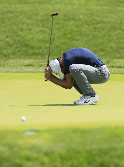 Second Place, Team Picture Story - Adam Cairns / The Columbus Dispatch, "The Memorial"Julian Suri reacts to a missed putt on the 13th hole during the third round of the Memorial Tournament at Muirfield Village Golf Club in Dublin, Ohio on June 2, 2018. 