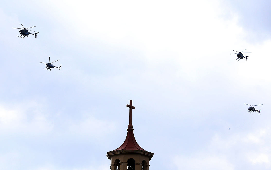 , Team Picture Story - Lorrie Cecil / Dsipatch Media Group, "Westerville Strong"Four police helicopters fly over St. Paul the Apostle Parish at the conclusion of the joint funeral for Westerville Police Officers Eric Joering and Anthony Morelli on February 16, 2018.