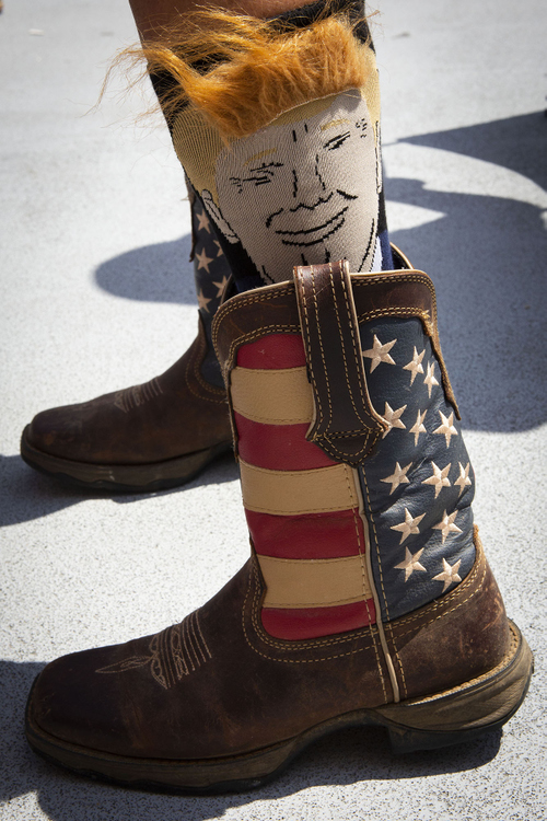 Second Place, Chuck Scott Student Photographer of the Year - Madeleine Hordinski / Ohio UniversityCindy Tekulve, of New Richmond, Kentucky, waits in line outside of the U.S. Bank Arena for President Trump's "Keep America Great" campaign rally on Thursday, August 1, 2019.