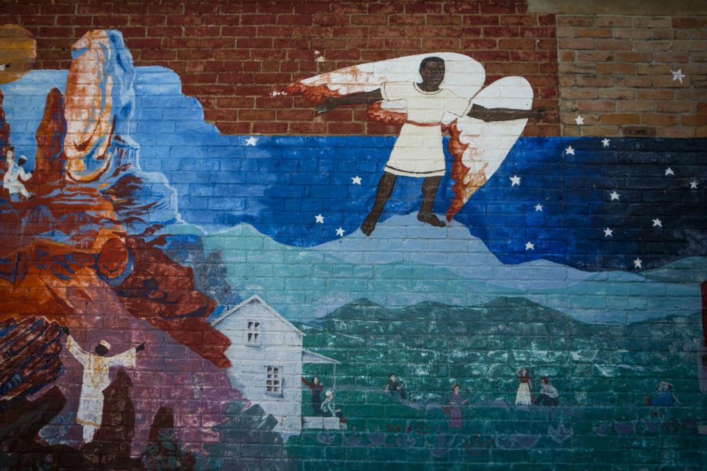 Second Place, Chuck Scott Student Photographer of the Year - Madeleine Hordinski / Ohio UniversityA mural depicts an angel on East McMicken Avenue in Over-the-Rhine on Thursday, July 11, 2019.