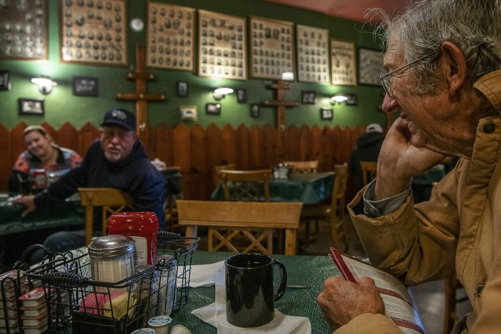 Second Place, Feature Picture Story - Gaelen Morse / Ohio University, “Farming is Life”Lowell smiles as he chats with Buddy Switzer and his daughter-in-law, Sadie Yarber, at Biancke's Restaurant in Cnythiana, Ky., during breakfast on Nov. 1, 2019.