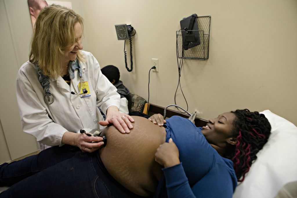 Third Place, Feature Picture Story - Albert Cesare / The Cincinnati Enquirer, “Finding Home”Nurse Kathy McClish checks the heartbeat of April Austin's baby during a prenatal appointment March 21, 2019, in Forest Park. April said she became pregnant while briefly trying to reconcile with her estranged husband, Brandon Austin, in October. She filed for divorce April 30, 2019. 
