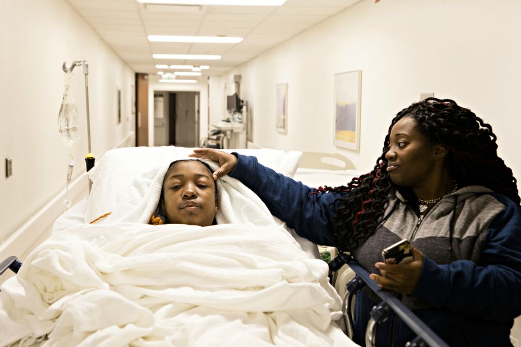 Third Place, Feature Picture Story - Albert Cesare / The Cincinnati Enquirer, “Finding Home”April Austin comforts her daughter, Genea Bouldin, 18, after surgery at the Cleveland Clinic on March 22, 2019. 
