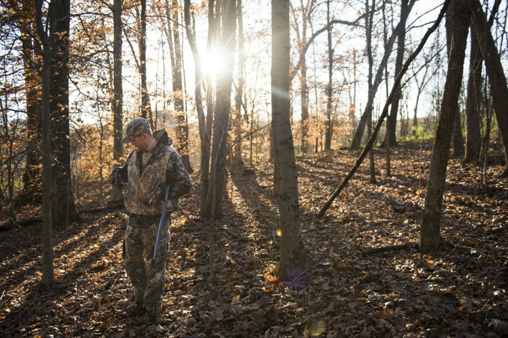 Second Place, Larry Fullerton Photojournalism Scholarship - Alexandria Skowronski / Ohio UniversityOfficer Andrew Foster of the Athens Police Department hunts for squirrels in the woods behind his house on November 11, 2018.  Foster took two weeks off from work this hunting season to spend time with his family and hunt. 