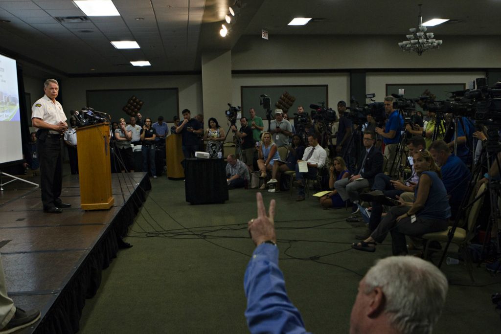 Award of Excellence, News Picture Story - Albert Cesare / The Cincinnati Enquirer, “Mass Shooting Dayton ”Dayton Police Chief Richard Biehl speaks during a press conference about a mass shooting that left ten dead, including the shooter, and 26 injured along the 400 block of E. Fifth Street, Sunday, Aug. 4, 2019, in Dayton , Ohio. 