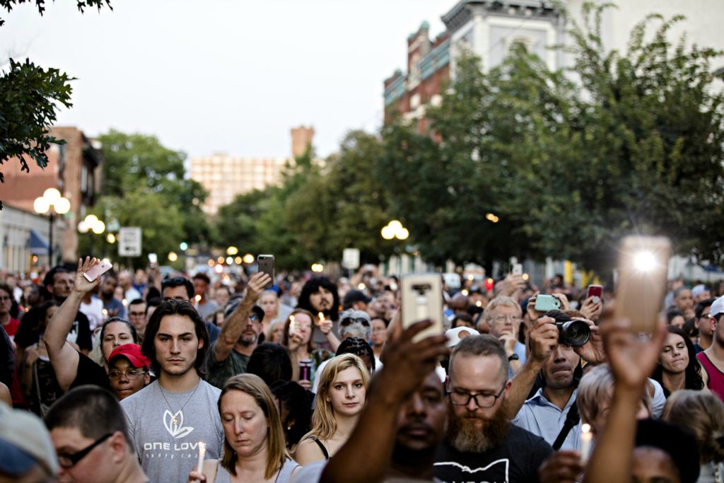 Award of Excellence, News Picture Story - Albert Cesare / The Cincinnati Enquirer, “Mass Shooting Dayton ”People look on during a vigil for the victims of  a mass shooting in the Oregon District of Dayton, Ohio, on Sunday, Aug. 4, 2019. 