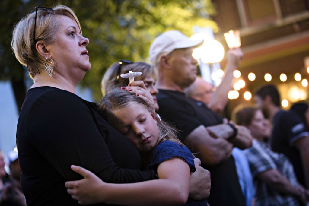 Award of Excellence, News Picture Story - Albert Cesare / The Cincinnati Enquirer, “Mass Shooting Dayton ”A woman embraces a child during a vigil for the victims of  a mass shooting in the Oregon District of Dayton, Ohio, on Sunday, Aug. 4, 2019. 