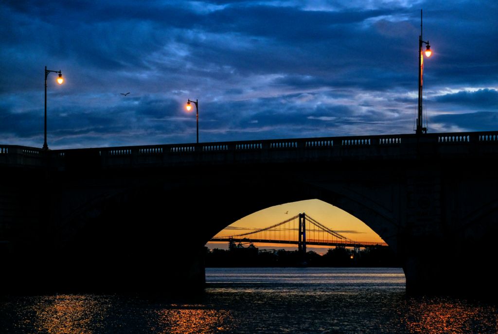 Award of Excellence, Pictorial - Jeremy Wadsworth / The Blade, “Bridges”The Anthony Wayne Bridge framed by the Martin Luther King Junior Bridge in the foreground as the sunsets October, 3, 2019, in Toledo. 